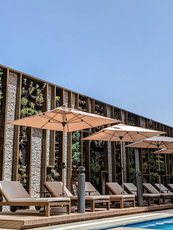 Citadines Abha Aparthotel Exterior photo The restaurant's patio