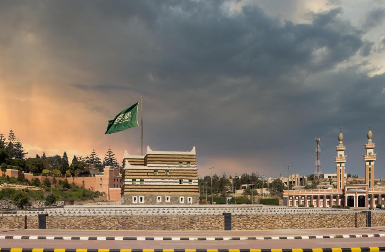 Citadines Abha Aparthotel Exterior photo The Saudi Arabian flag flying in the city of Riyadh