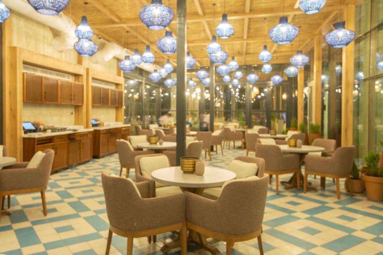 Citadines Abha Aparthotel Exterior photo The interior of the restaurant